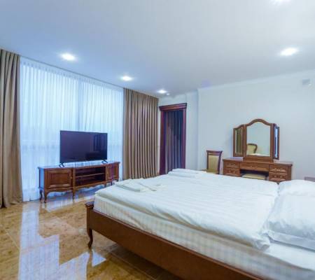 King Suite with Balcony and Living Room